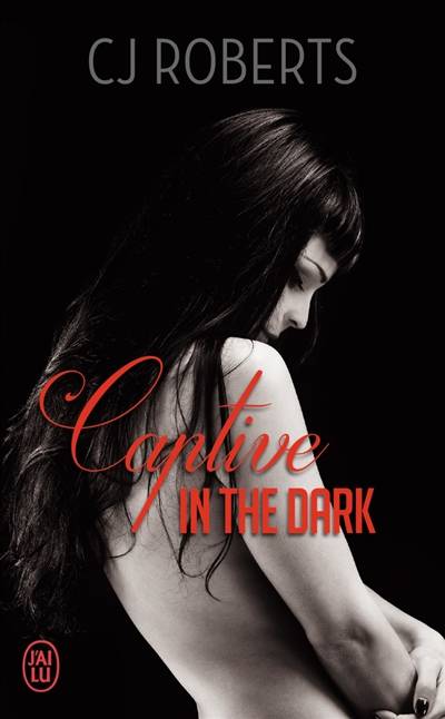 Captive in the dark | C.J. Roberts, Paule Duverger