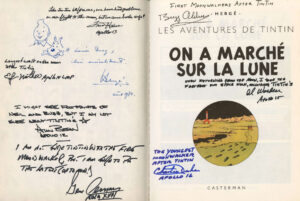 Album dédicacé par Hergé et par un astronaute de chacune des 7 missions lunaires habitées.
